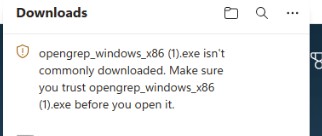 Microsoft Edge Downloads panel showing OpenGrep is not commonly downloaded